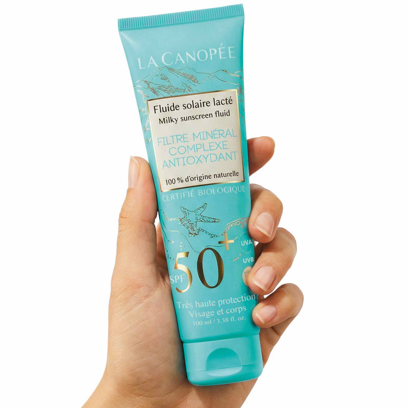 Fluide Solaire Lacté SPF50+ – Visage & Corps